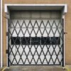 Single Fold Security Gate 7 Ft. H X 7 Ft. W Steel Accordion Security Gate With Padlock 360° Rolling Gate -Patio Furniture Shop black vevor garden fencing ssfdmdm2x2m000001v0 64 1000